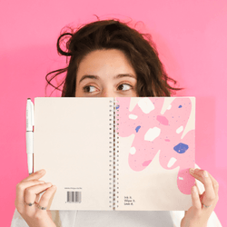 girl-showing-her-erasable-stone-paper-notebooks