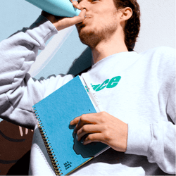 guy-holding-sky-blue-solid-elegance-erasable-notebook