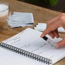 someone-erasing-the-ns-recycled-plastic-notebook