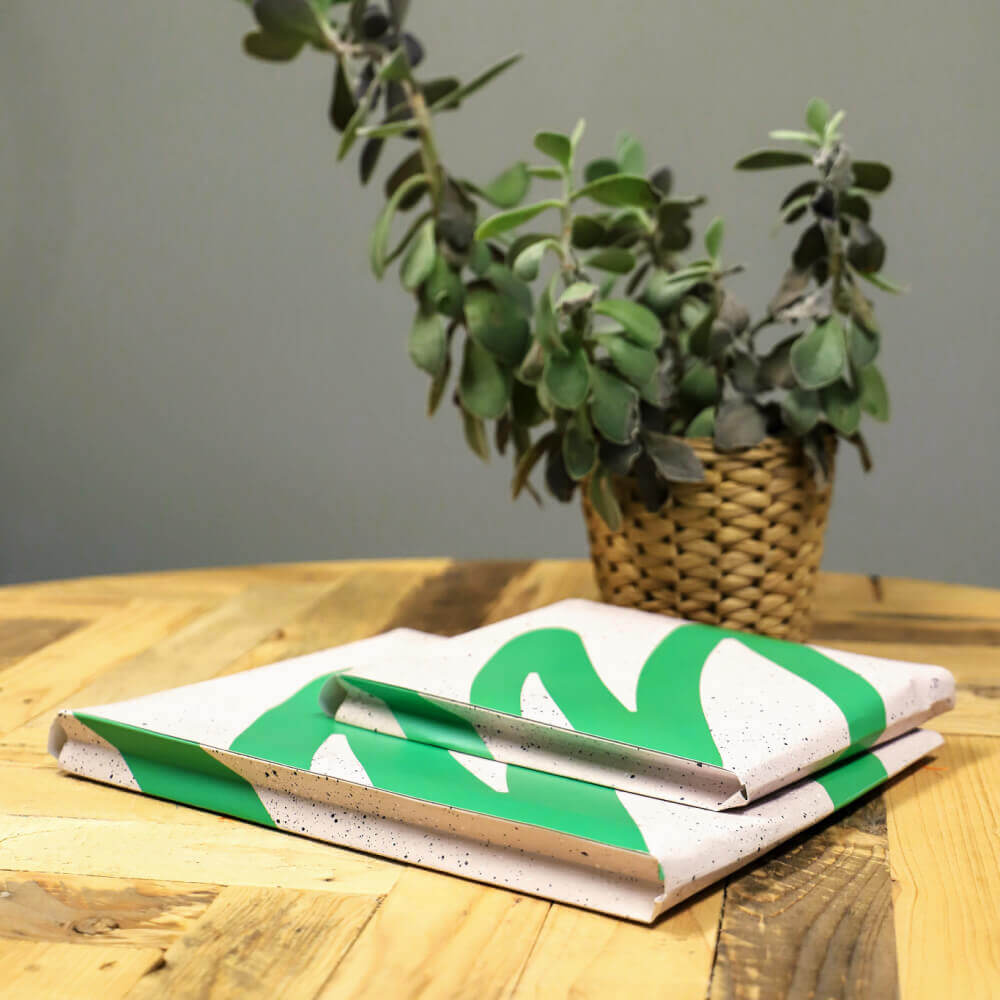 two-stone-paper-envelopes-on-a-table