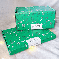 Two MOYU Christmas boxes