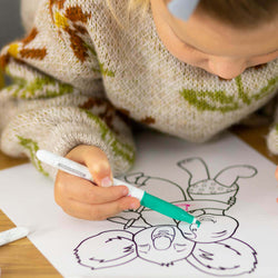 kid-drawing-with-erasable-marker
