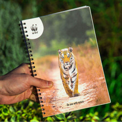person-holding-a-wwf-tiger-notebook