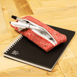 red-recycled-felt-pencil-case-on-black-notebook