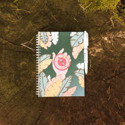 Soul compass notebook on a tree trunk